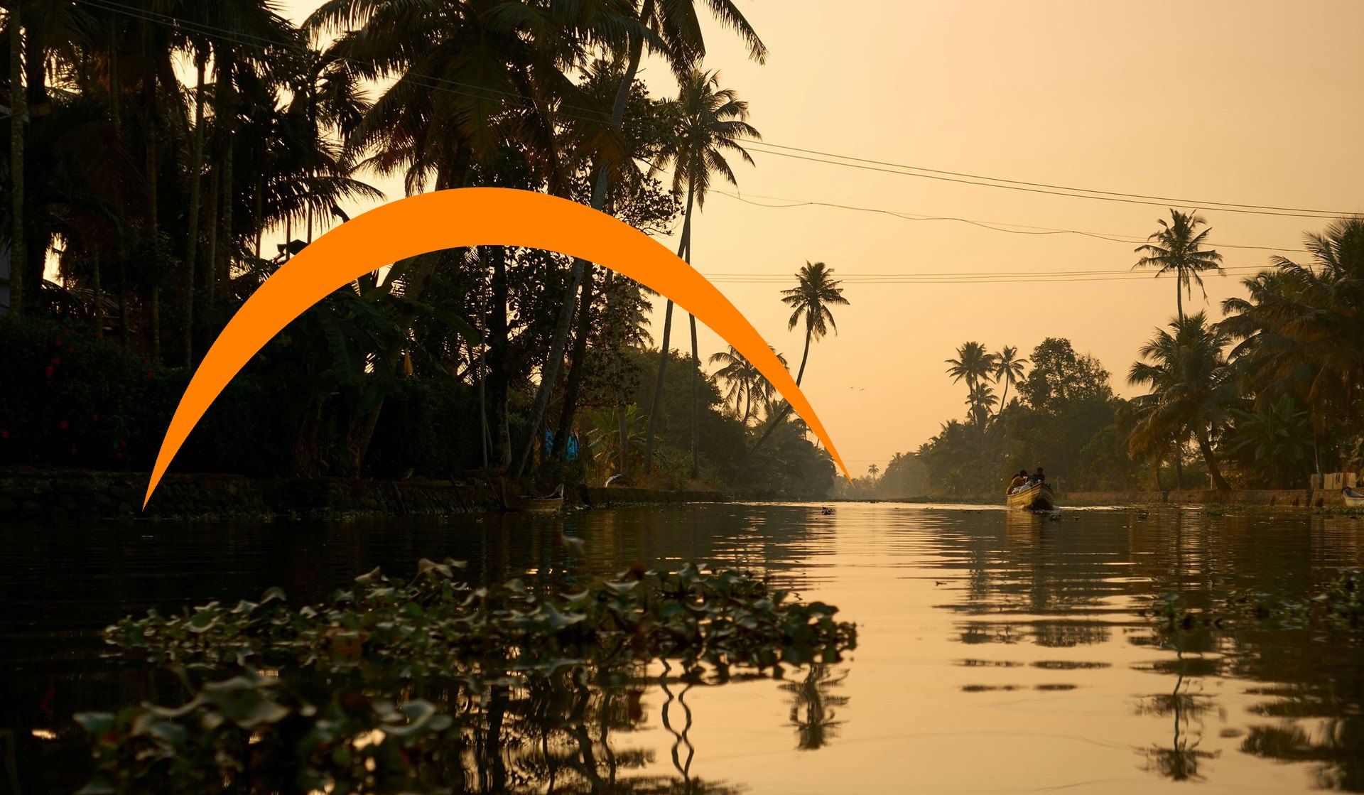 Kerala backwaters at sunset with the Gen India orange swoosh