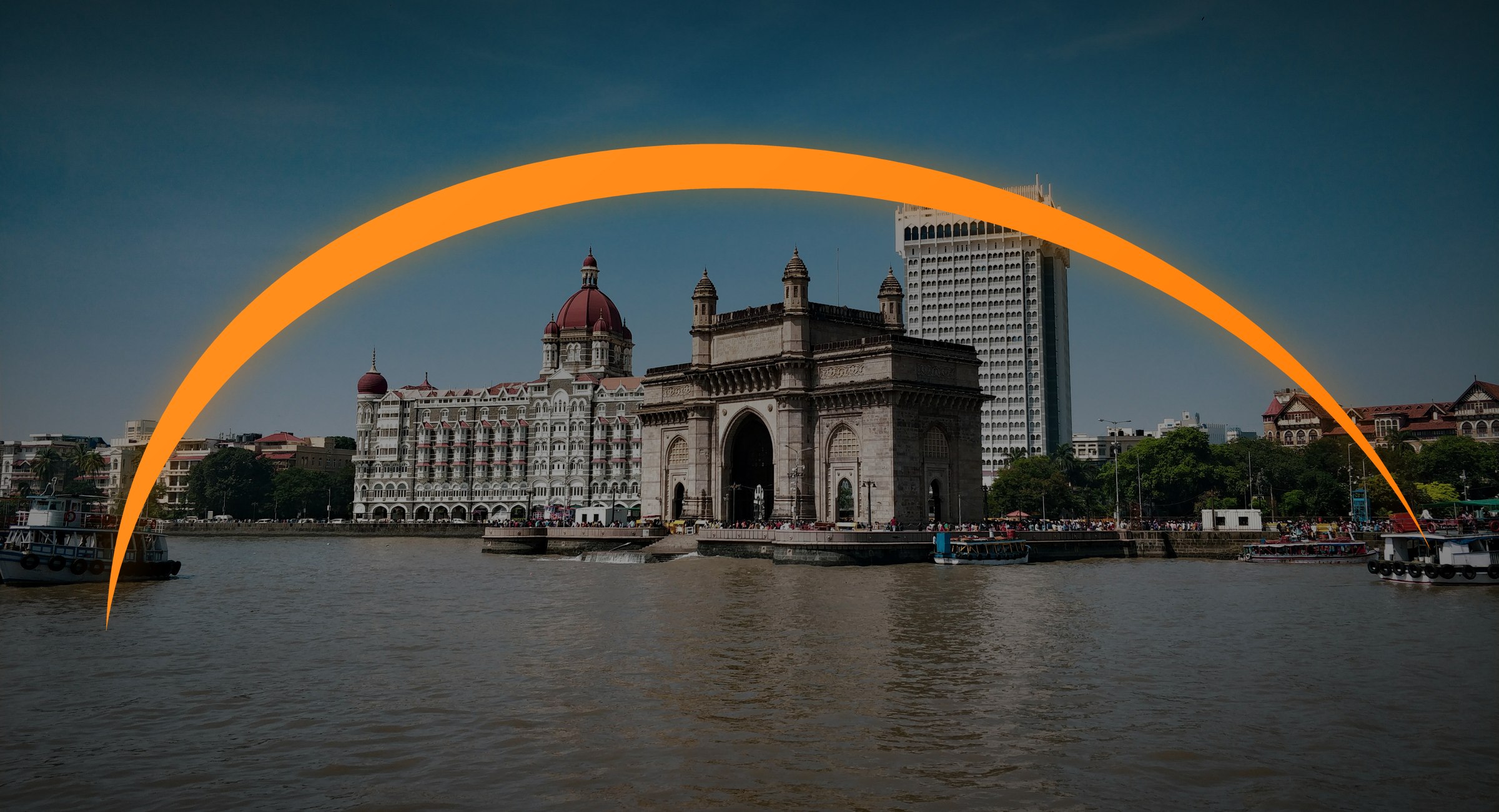Gateway of India in Mumbai with the Gen India orange swoosh